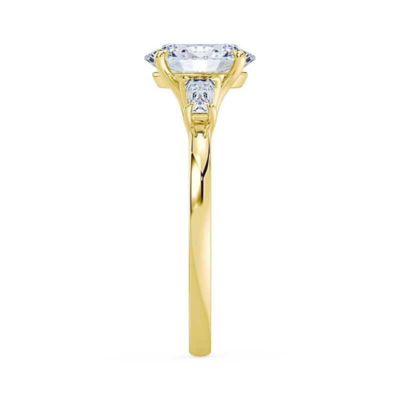 Three Stone Oval Baguette Ring