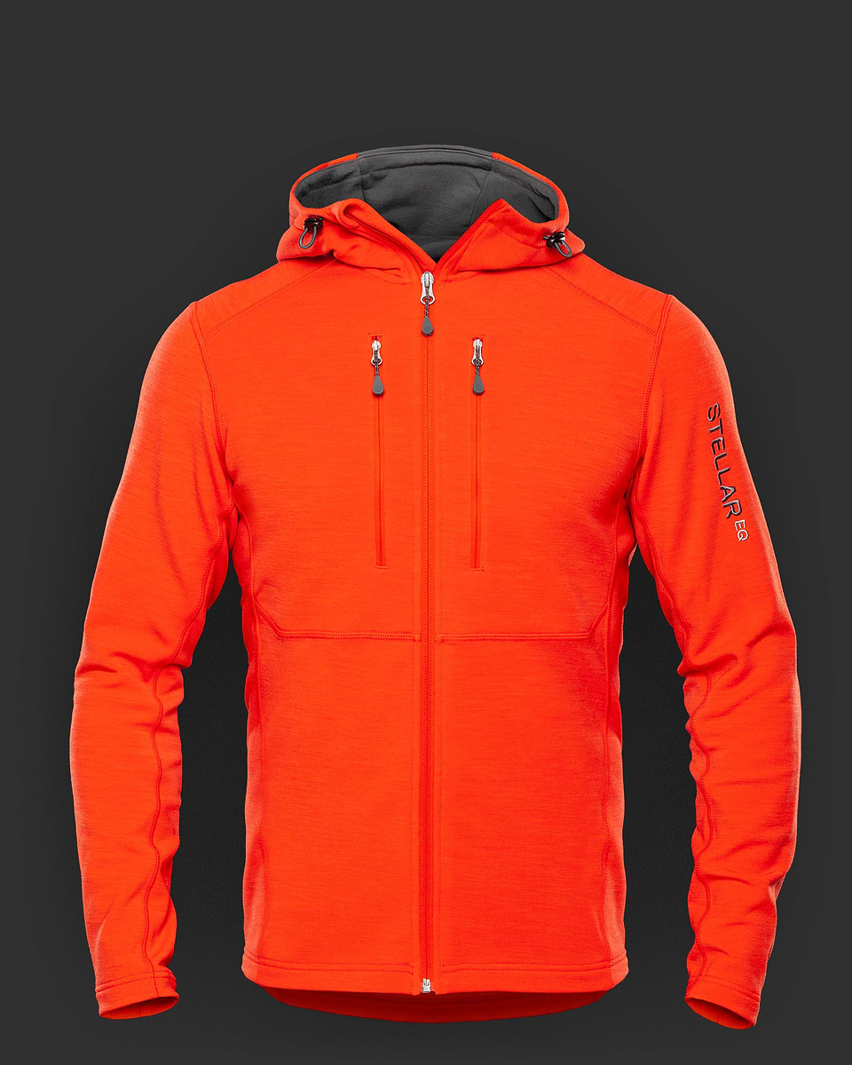 Stellar Equipment. Orange merino wool/fleece jacket with hood for men. Warm, wind-resistant, fast-wicking, stretchable and seriously comfortable, this is a jacket you can — and will — use for any activity, at any time, in any season.