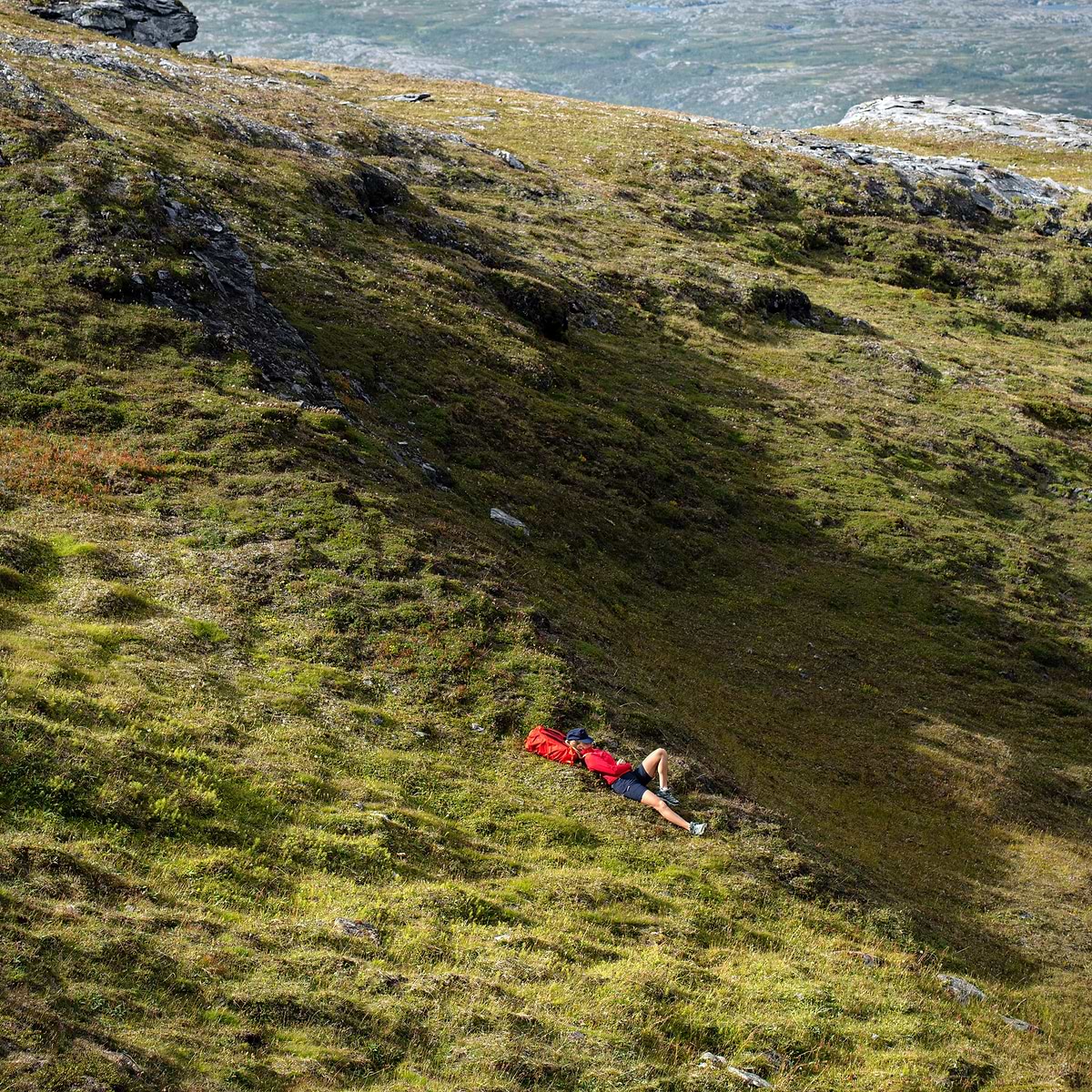 Malou taking a rest after hiking in Lappland. Picture captured by Mathias Fredriksson.