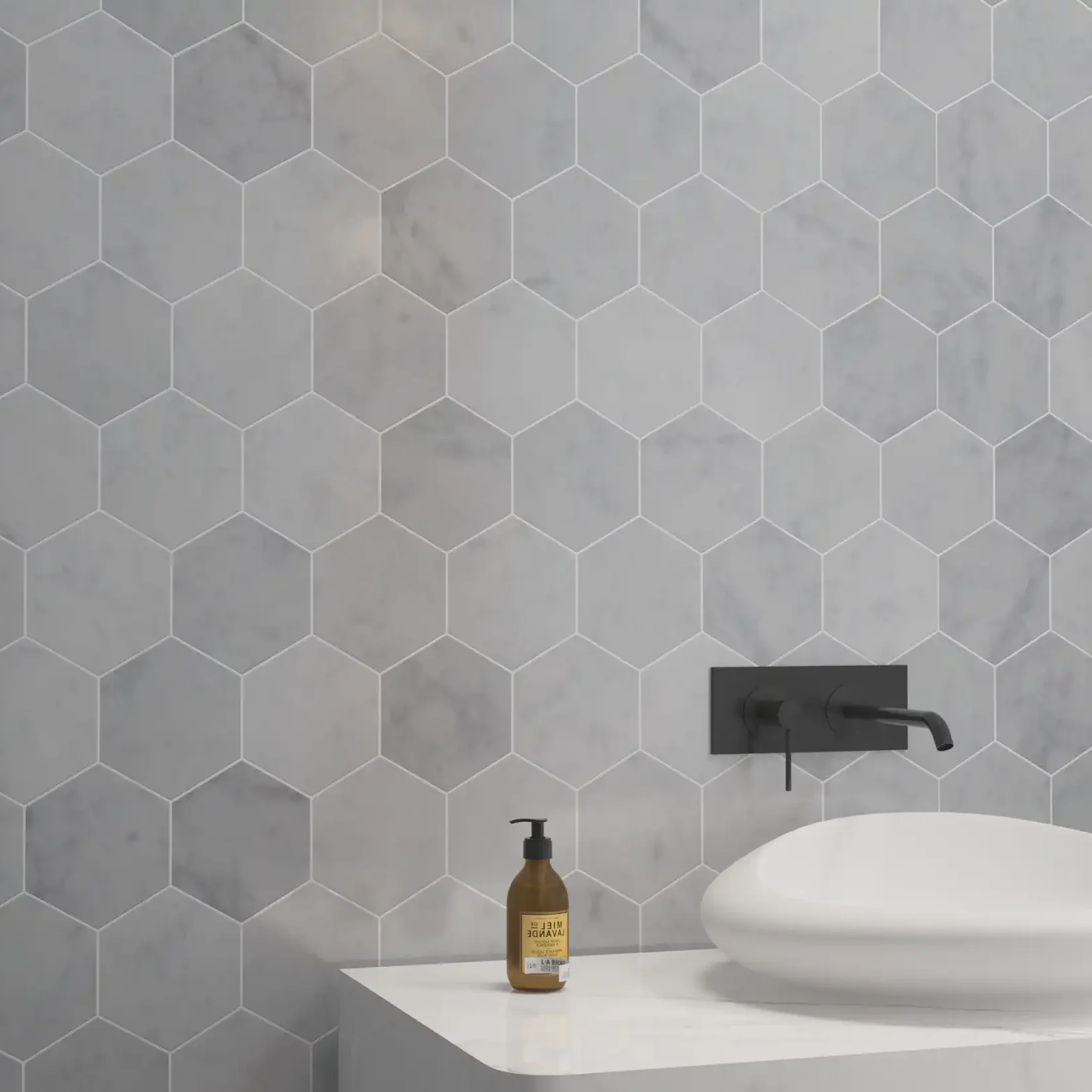 Bathroom sink backsplash with installed 5x5 Marble Honed Hexagon Mosaic Tile