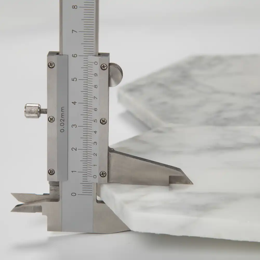Measure of thickness in 5x5 Marble Honed Hexagon Mosaic Tile