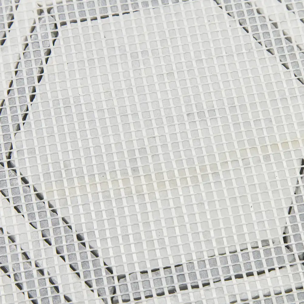 Close up view of mesh fabric on back of 5x5 Marble Polished with Bardiglio Grey Hexagon Mosaic Tile