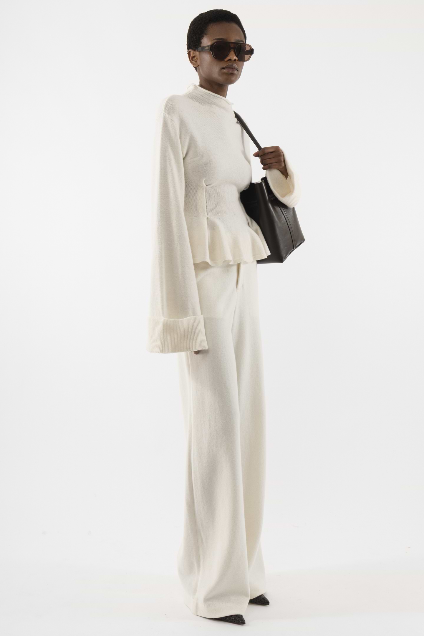 Knitted Relaxed Peplum Sweater - Arakii