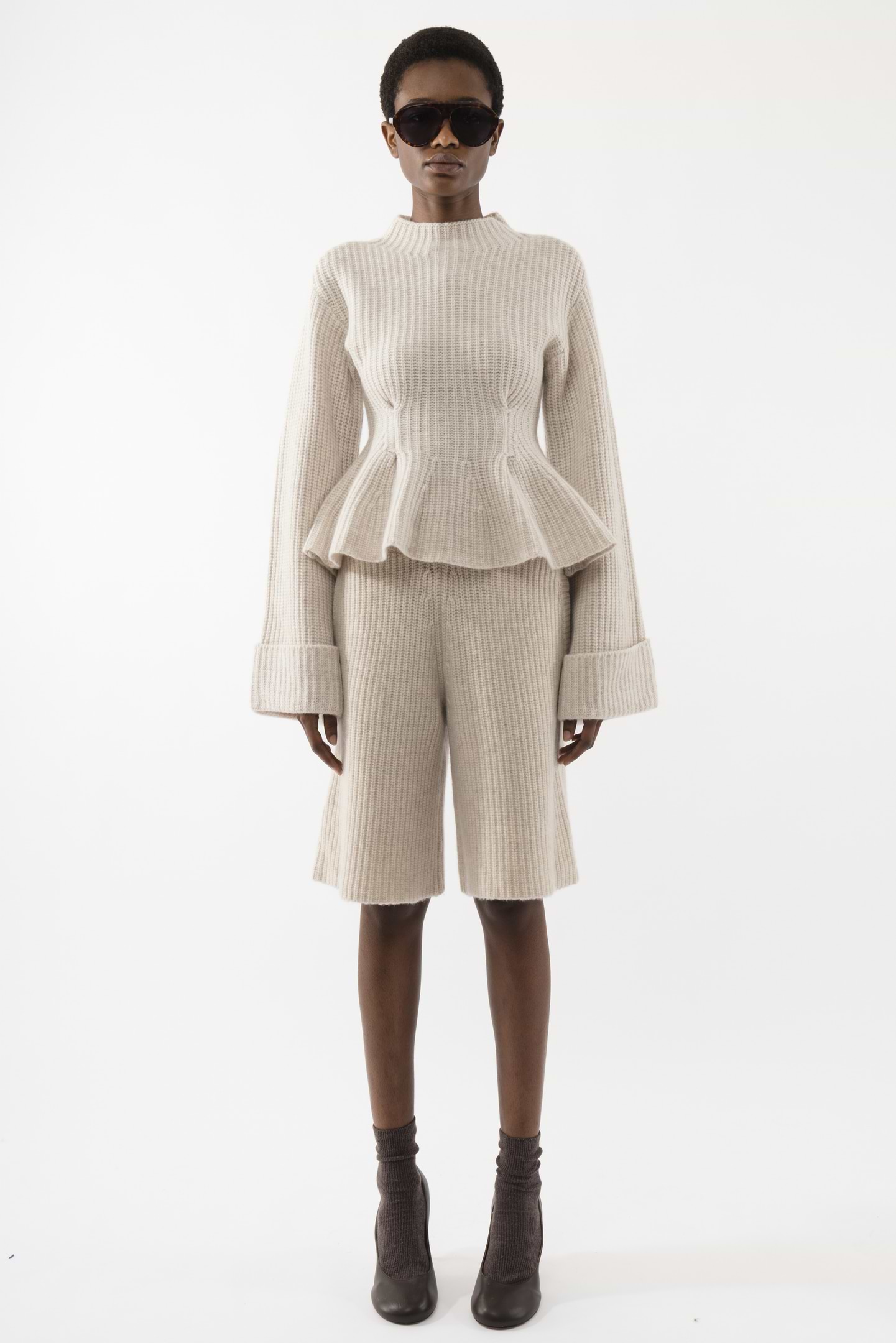 Heavy Knitted Peplum Turtleneck