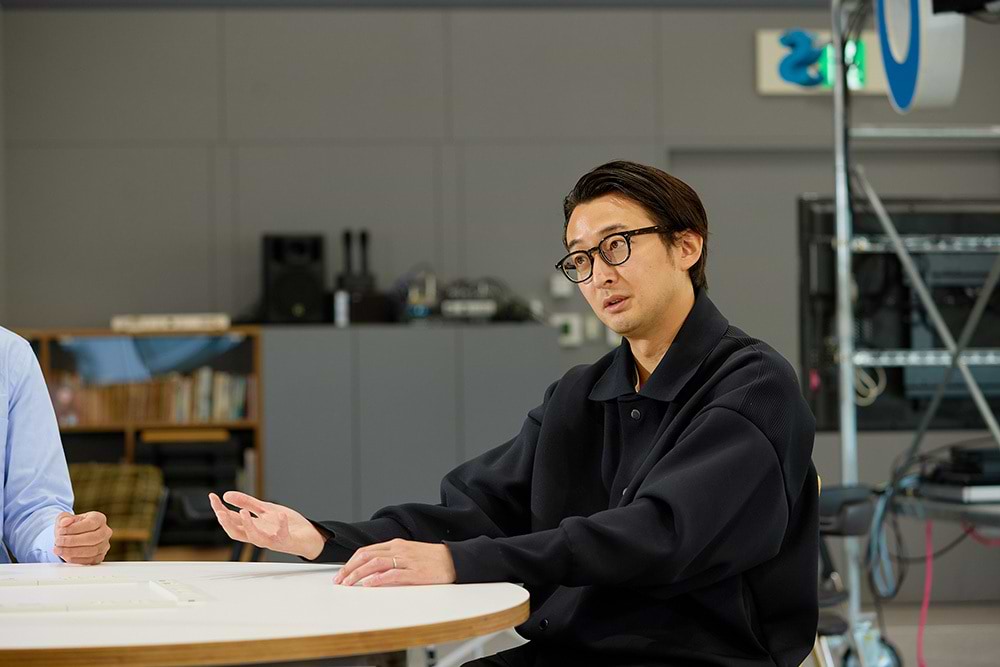 本間隆平氏