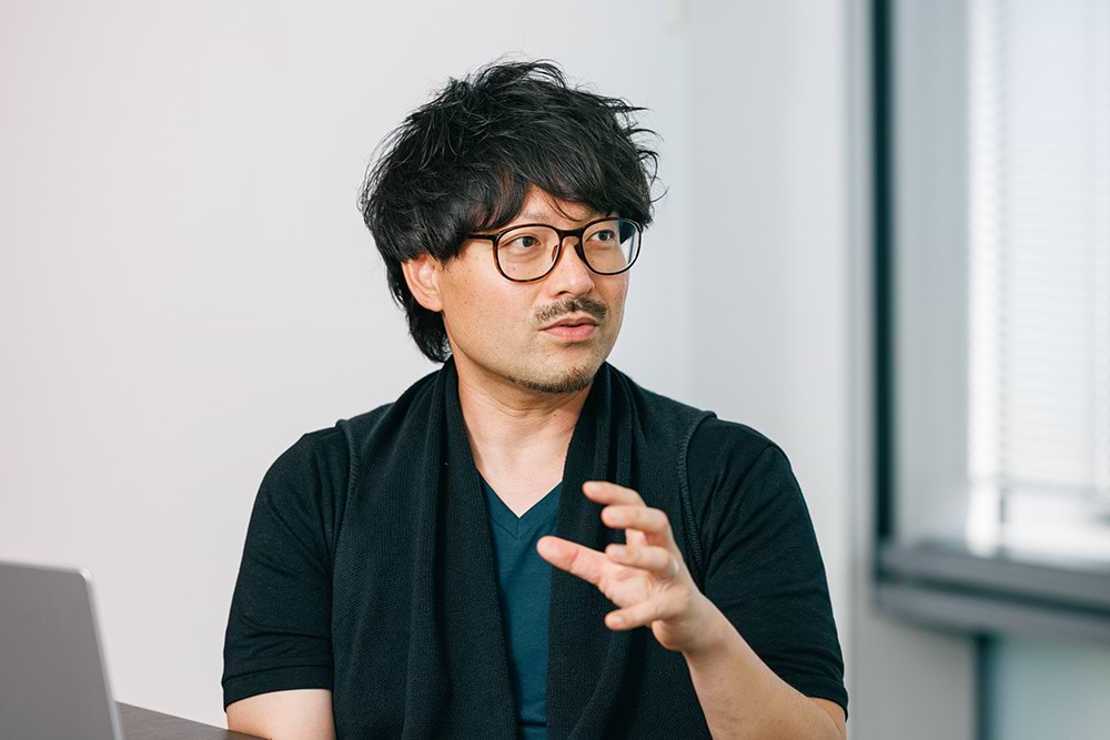高橋氏