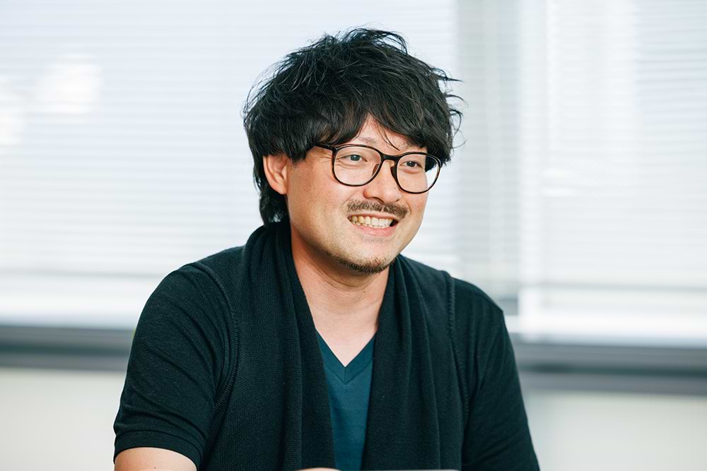 高橋氏