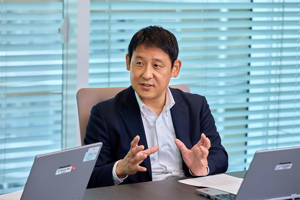 髙田氏